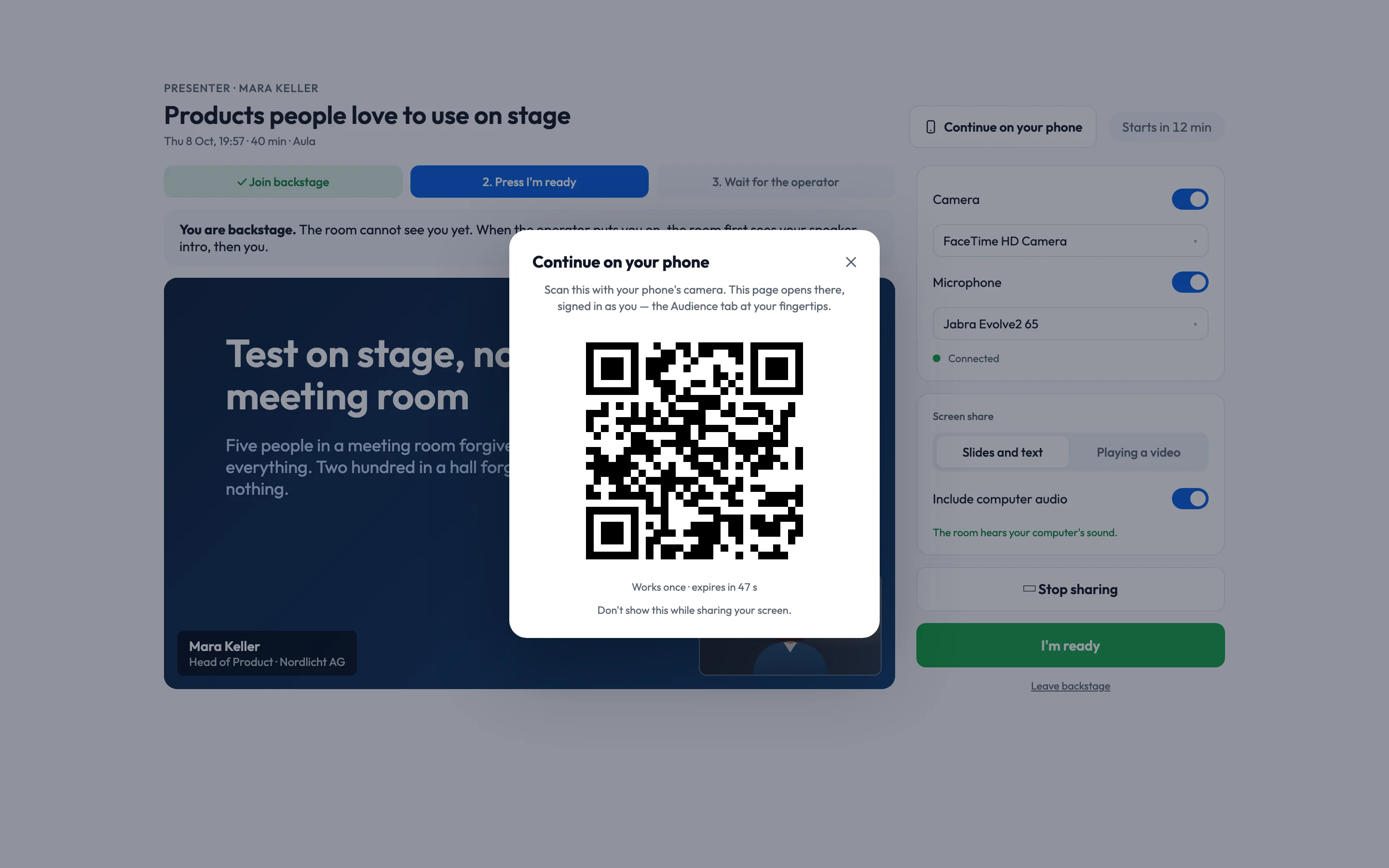 The presenter page behind a dialog titled Continue on your phone, with a one-time QR code that expires in 47 seconds.